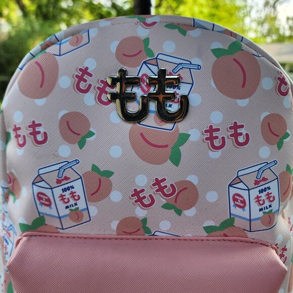 BioWorld Pastel Peach Milk Mini PVC Backpack - Picture 4 of 14